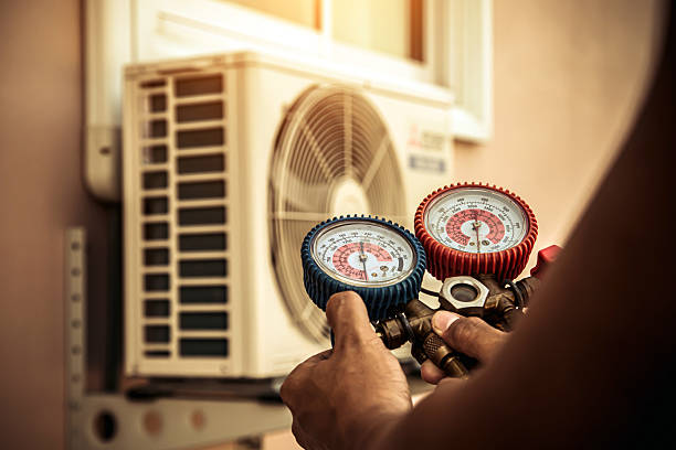 Professional Air Conditioning Service technician working in Gerrardstown, WV